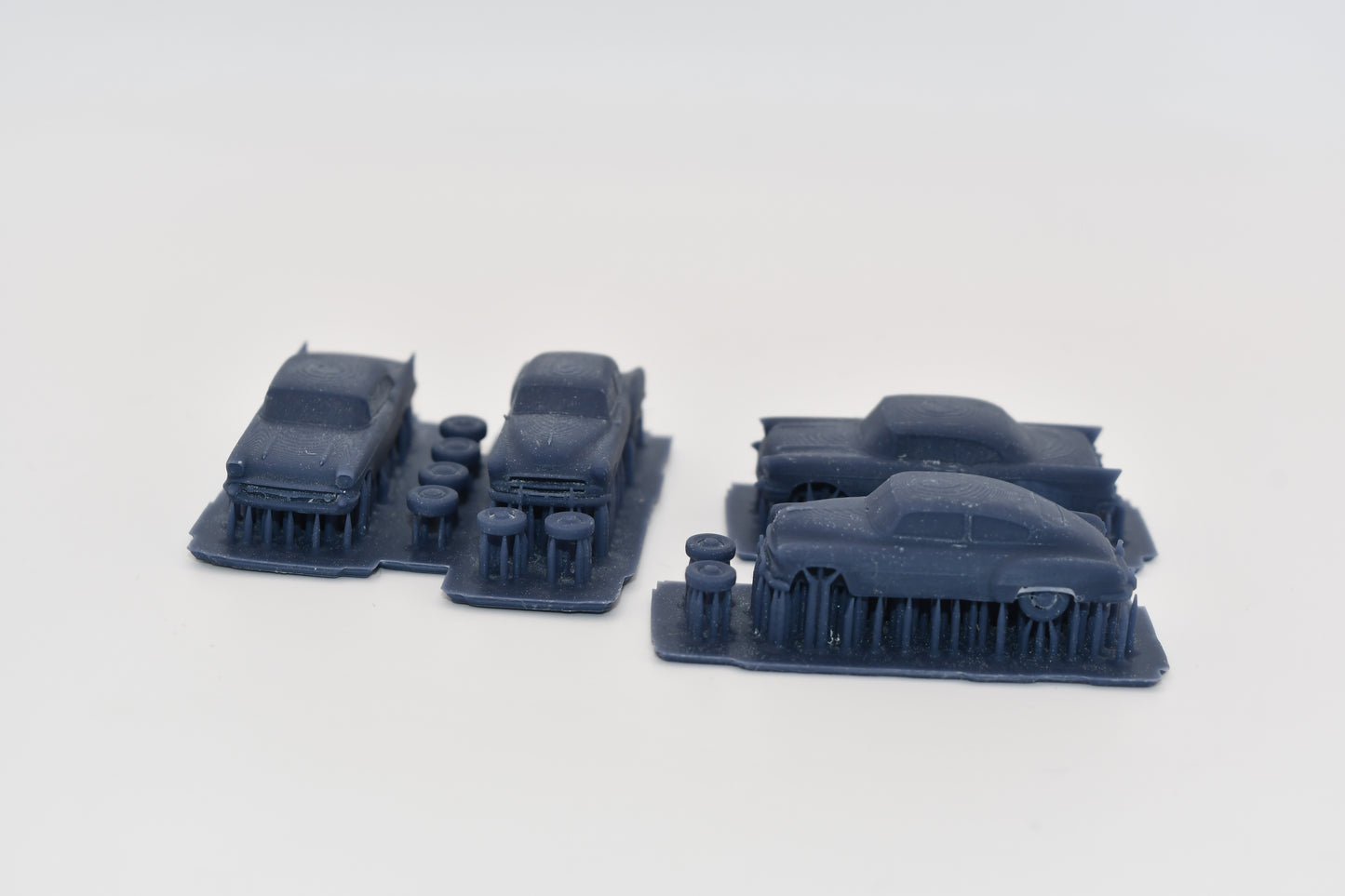 N scale resin cars from the 1950s. Including two 55-57 Chevys and two 51 Chevys