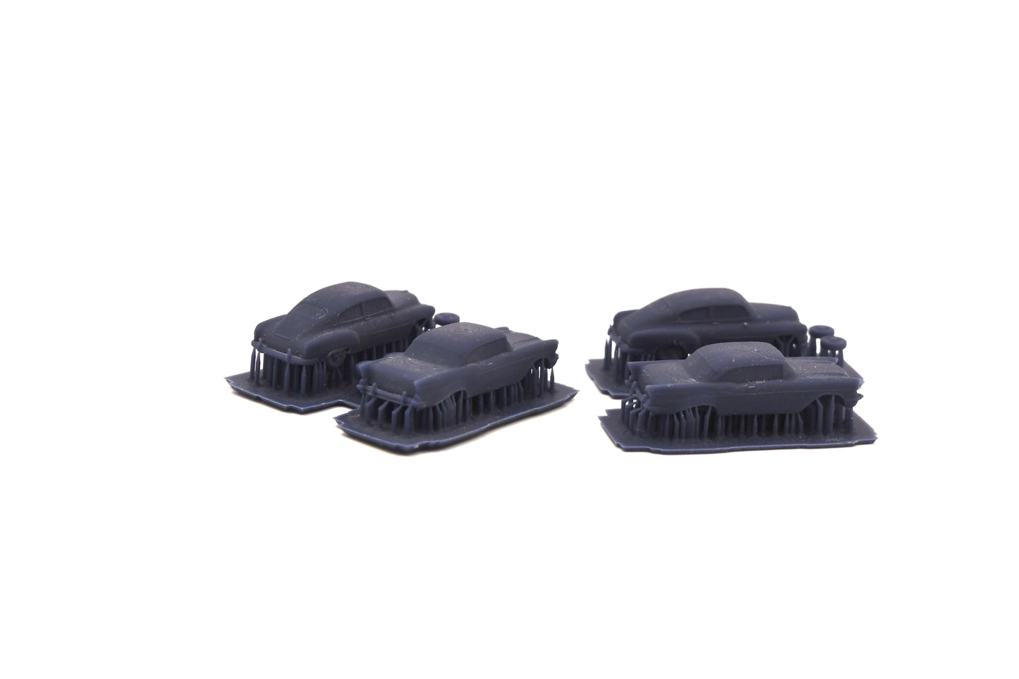 N scale resin cars from the 1950s. Including two 55-57 Chevys and two 51 Chevys