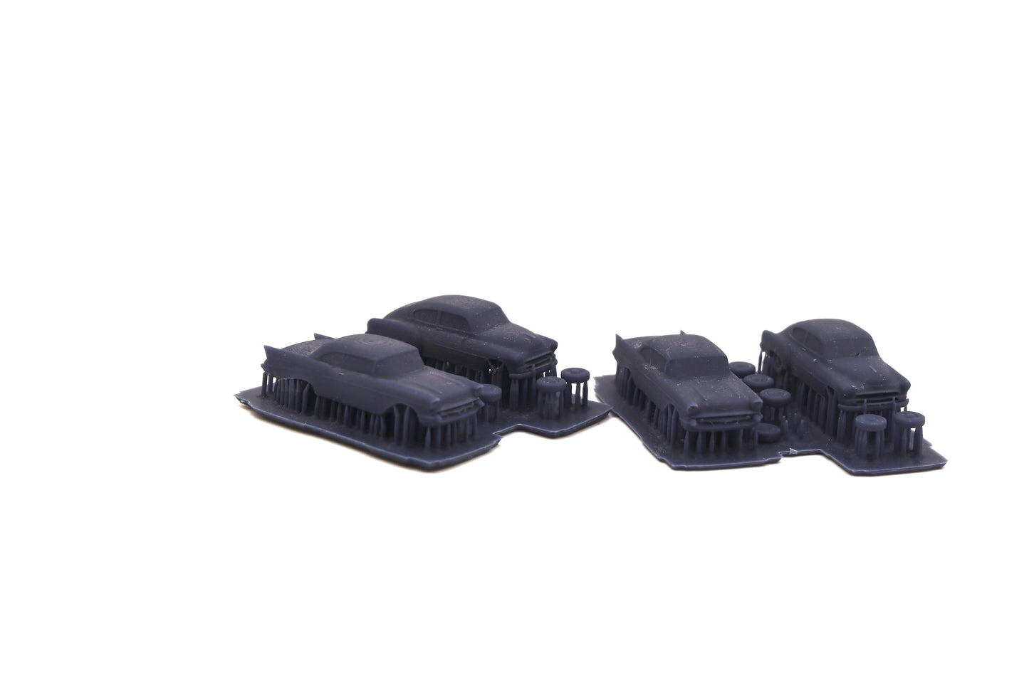 N scale resin cars from the 1950s. Including two 55-57 Chevys and two 51 Chevys