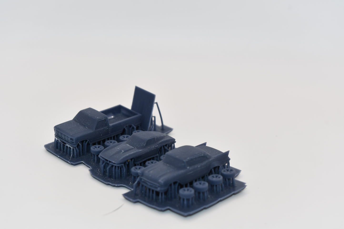 N scale resin Restomods kit including a tri 5 Chevy, Ford pickup, and Corvette