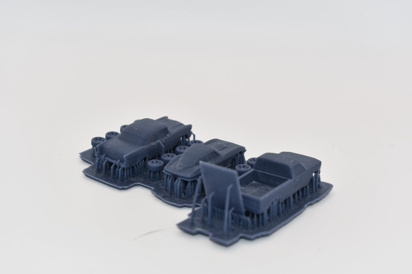N scale resin Restomods kit including a tri 5 Chevy, Ford pickup, and Corvette