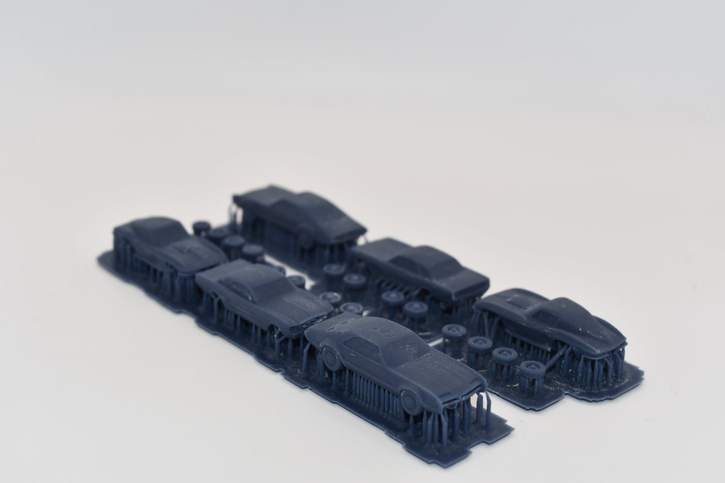 N scale resin cars from the 1960s.  Including a Mustang, Corvette, and Olds