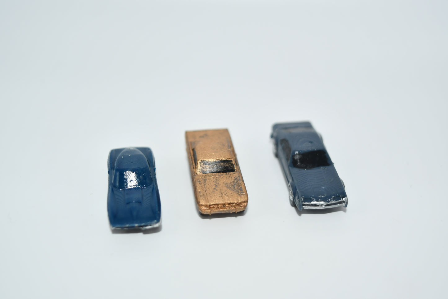 N scale resin cars from the 1960s.  Including a Mustang, Corvette, and Olds