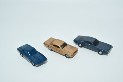 N scale resin cars from the 1960s.  Including a Mustang, Corvette, and Olds