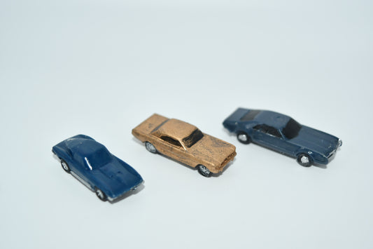 N scale resin cars from the 1960s.  Including a Mustang, Corvette, and Olds