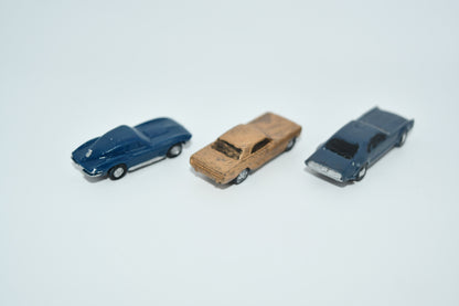 N scale resin cars from the 1960s.  Including a Mustang, Corvette, and Olds