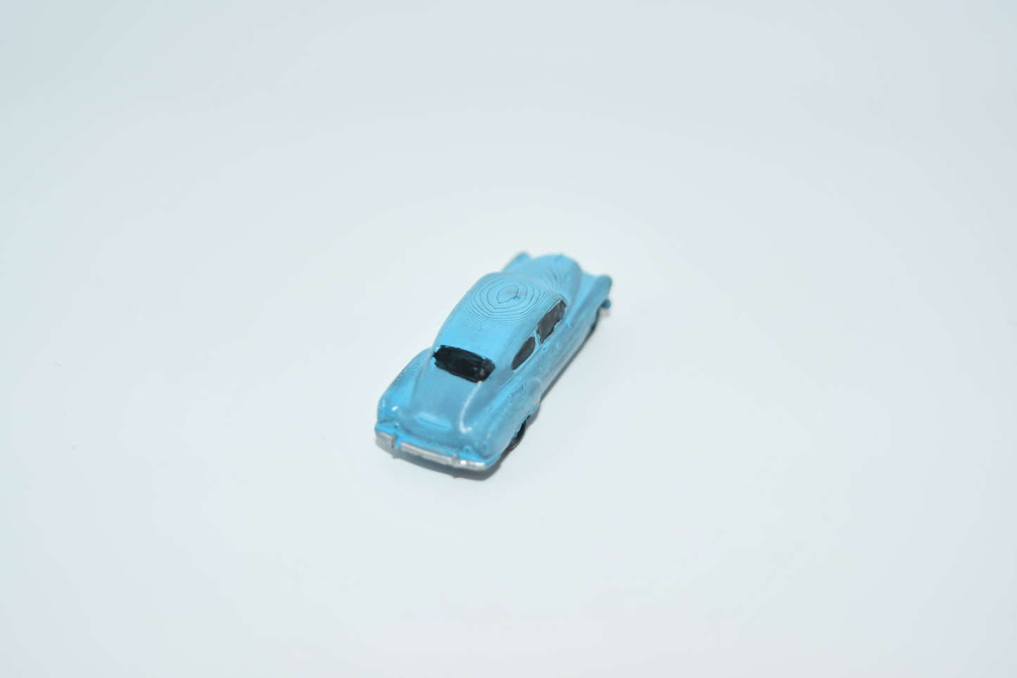N scale resin cars from the 1950s. Including two 55-57 Chevys and two 51 Chevys