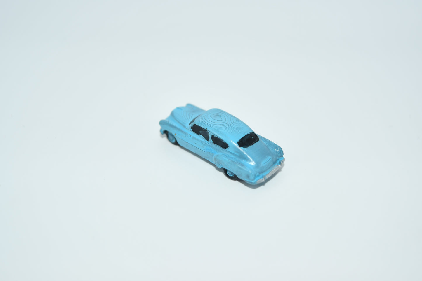 N scale resin cars from the 1950s. Including two 55-57 Chevys and two 51 Chevys