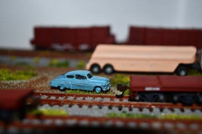 N scale resin cars from the 1950s. Including two 55-57 Chevys and two 51 Chevys