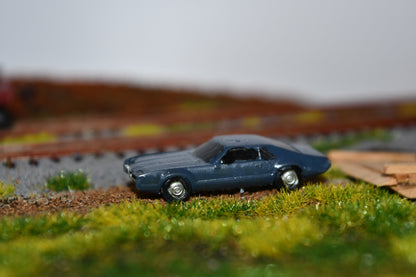 N scale resin cars from the 1960s.  Including a Mustang, Corvette, and Olds