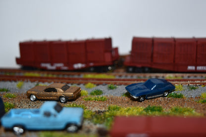 N scale resin cars from the 1960s.  Including a Mustang, Corvette, and Olds