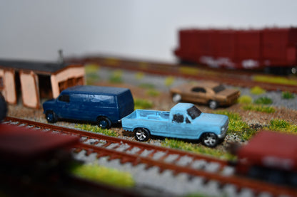 N scale resin cars from the 1960s.  Including a Mustang, Corvette, and Olds