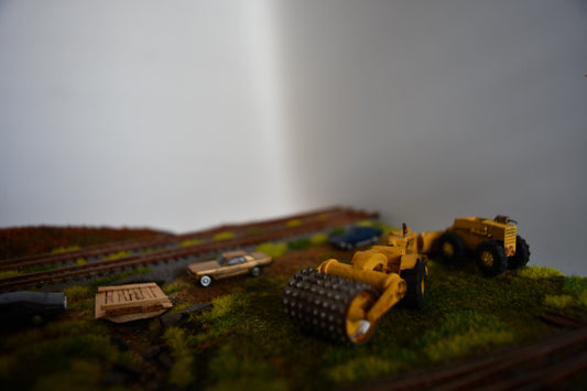 N Scale Compactor Cat DW20 open cab