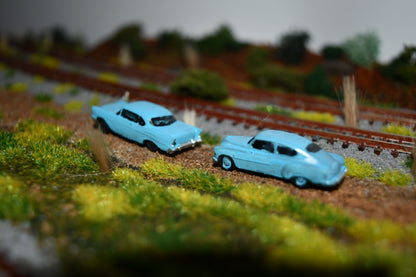 N scale resin cars from the 1950s. Including two 55-57 Chevys and two 51 Chevys