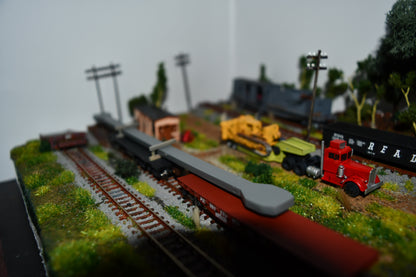 N scale Press arm load for Heavy flat cars.