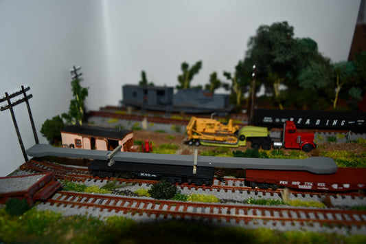 N scale Press arm load for Heavy flat cars.