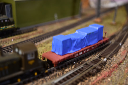 Tarped crates load in N scale